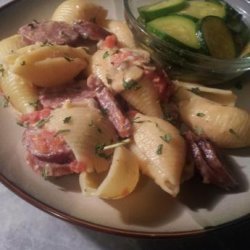 Pasta in Sausage, Cremini, and Tomato Cream Sauce