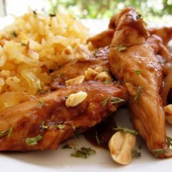 Sriracha-Glazed Chicken and Onions over Long-Grain Rice