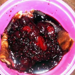Skillet Custard with Berry Sauce