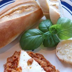 Queso De Cabra Con Tomate (Goat Cheese Baked in Tomato Sauce)