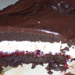 Fudgy Chocolate Layer Cake With Raspberry Chambord Whipped Cream