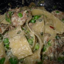 Tagliatelle With Smashed Peas, Sausage, and Ricotta Cheese-Giada