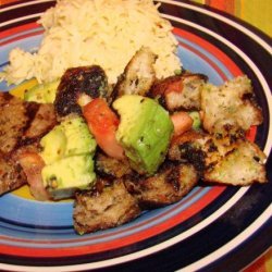 Grilled Garlic Steak With Tomato and Bread Topping