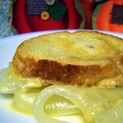 Baked Onions Topped With French Bread