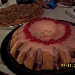 Cinnamon Roll Tea Ring With Cherry Frosting