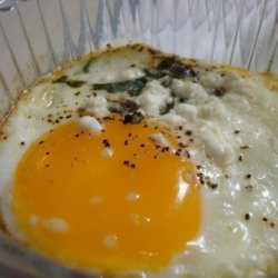 Baked Eggs With Fresh Herbs and Goat Cheese