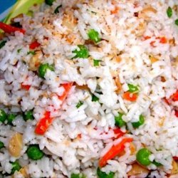 Coconut Rice Erupting With Spices, Nuts & Peas