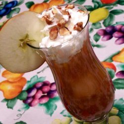 Chocolate-Covered Caramel Apples With Nuts