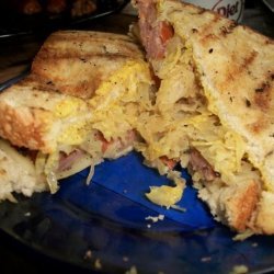 Brewed Brat Sandwiches With Caraway Kraut