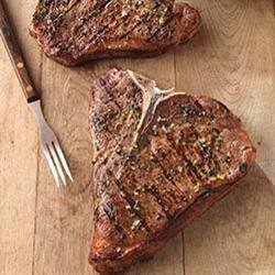 Greek-Seasoned T-Bone Steaks with Cucumber and Tomato Salad