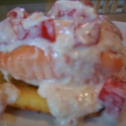 Salmon over Gritcakes With Tomato Alfredo