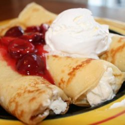 Cream Filled Crepes With Tart Cherry Sauce