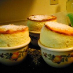 Coconut and White Chocolate Souffles With Mango-Rum Sauce