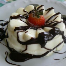 White Chocolate Panna Cotta With Dark Chocolate Sauce