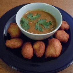 Sambhar Vada  (Yellow Lentil Soup With Spiced Doughnuts)