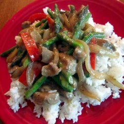 Beef Stir-Fry With Asparagus, Red Bell Peppers and Caramelized O