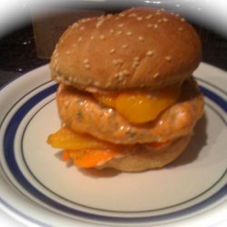 Salmon Burger With Roasted Sweet Peppers and Lemon Aioli Sauce.