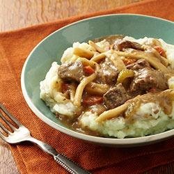 Beef and Noodles over Skin-On Mashed Potatoes