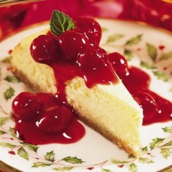 Eggnog Cheesecake With Cherry Sauce