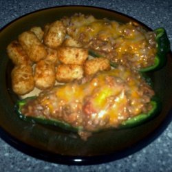 Refried Bean Stuffed Poblanos W/ Cheese