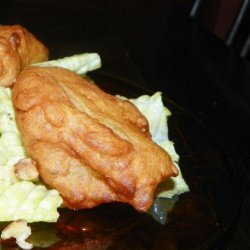 Cajun Parsnip Fritters on Baby Spinach