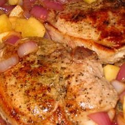 Pork Chops With Apples, Onions and Cheesy Baked Potatoes