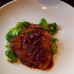 Seared Duck With Pinot Noir/Pomegrante Reduction