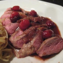 Duck Breasts With Cranberries & Honey Sauce