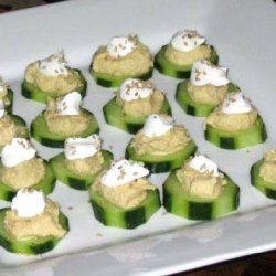 Cucumber Appetizer  Hummusyogurt And Sesame Seeds