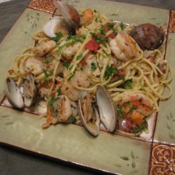 Seafood Linguine With Herbed Wine And Clam Broth
