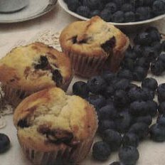 Pineapple-blueberry Muffins With Cream Cheese Fill...