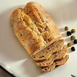 Anchovies And Lemon On Black Olive Bread