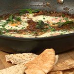 Baked Eggs With Tomato Herbs And Spinach