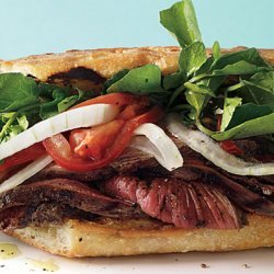 Grilled Steak Sandwiches with Marinated Watercress, Onion, and Tomato Salad