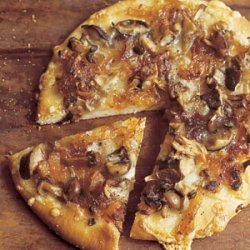 Wild Mushroom Pizza with Caramelized Onions, Fontina, and Rosemary