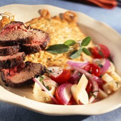 Patrick Sage-y Crusted Lamb Loin with Angel Hair Pancake and Broken Hearts of Palm-Tomato Salad