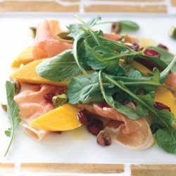 Prosciutto with Persimmon, Pomegranate, and Arugula