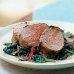 Pork Tenderloin on a Bed of Spinach, Piquillo Peppers, and Prosciutto