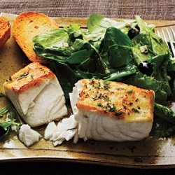 Halibut à la Provençal over Mixed Greens