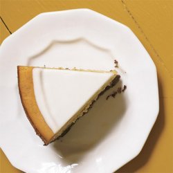 Pumpkin Cheesecake with Marshmallow-Sour Cream Topping and Gingersnap Crust