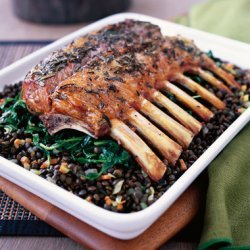 Mini Rack of Lamb with Nutty Beluga Lentils and Sautéed Garlic Spinach