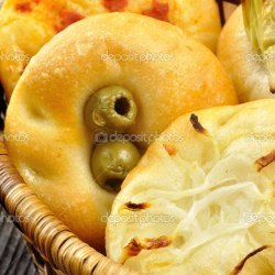 Onion, Tomato, and Olive Pizzas