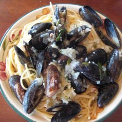 Garlicky Mussels in a Rich Lemon, Fresh Herb, Butter Sauce