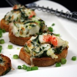 Garlic Bread Topped With Crab Meat and Spinach